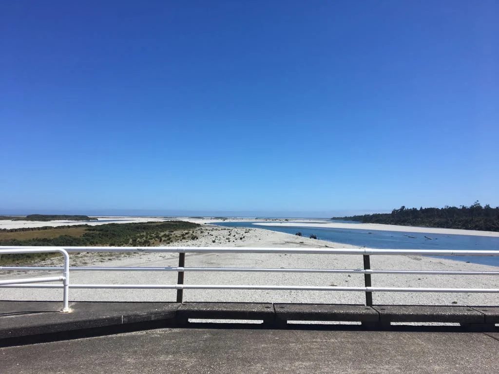 New Zealand coastal river meeting the sea